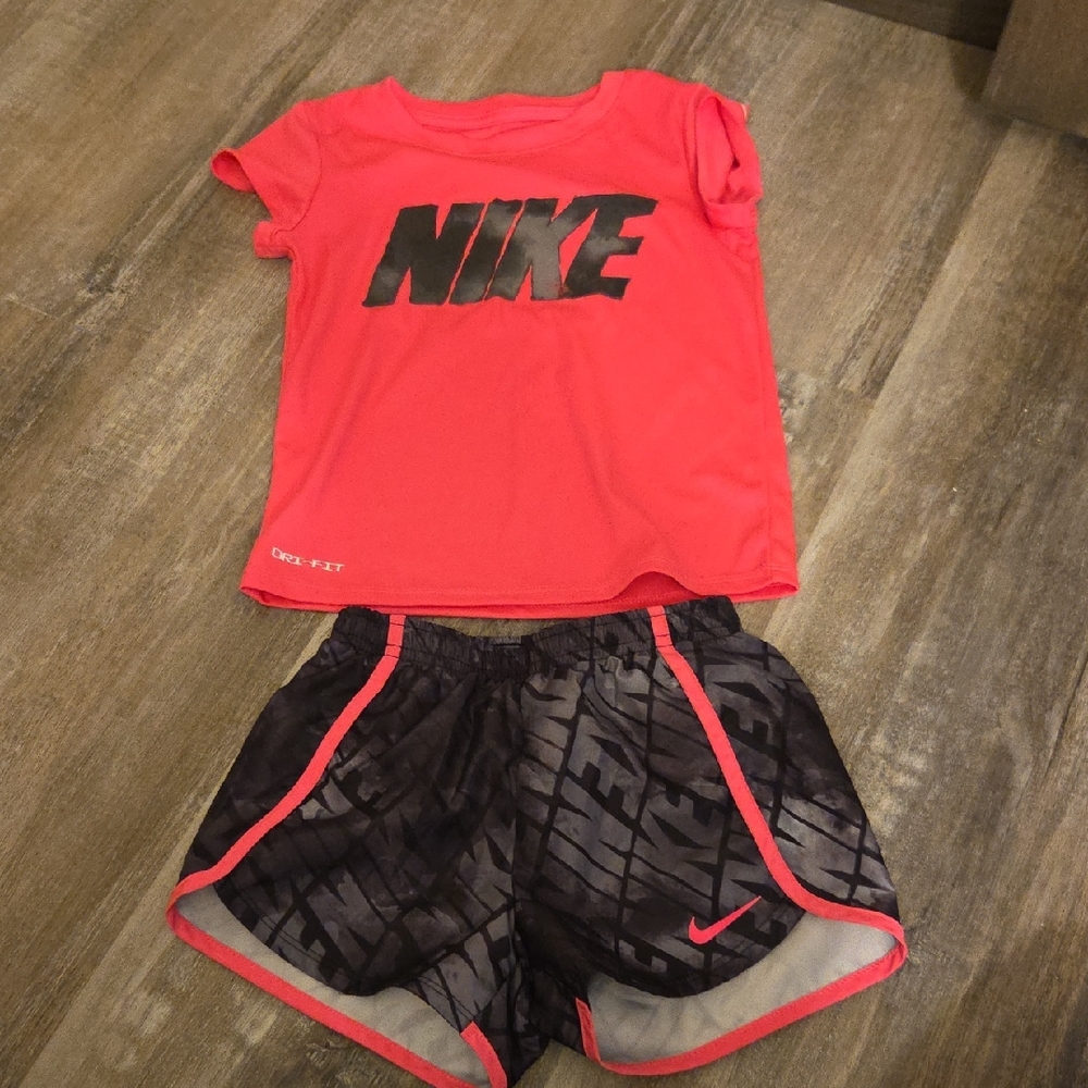 Nike Red Tee and Black Patterned Shorts